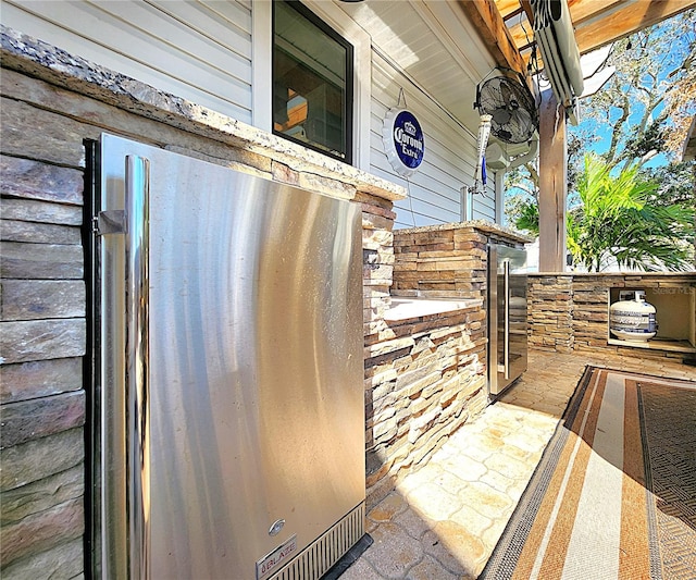 1608 20th Ave W, Palmetto, FL 34221 - exterior view of freestanding refrigerator and beverage cooler