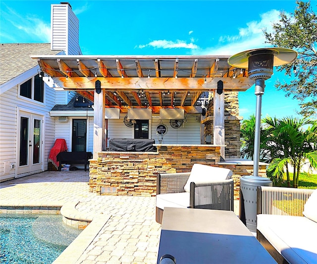 1608 20th Ave W, Palmetto, FL 34221 - view of patio featuring french doors and an outdoor pool