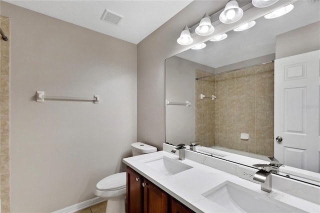 7732 Bulls Head Dr, Wesley Chapel, FL 33545 - bathroom featuring toilet, tile patterned flooring, double vanity, bathing tub / shower combination, and baseboards