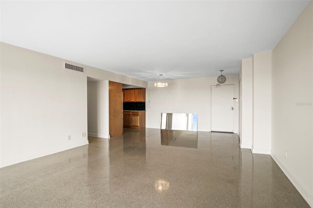 10355 Paradise Blvd Unit 1003, Treasure Island, FL 33706 - unfurnished room featuring light aggregate flooring