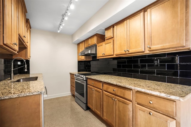 10355 Paradise Blvd Unit 1003, Treasure Island, FL 33706 - kitchen with a sink, under cabinet range hood, baseboards, electric stove, and light stone countertops