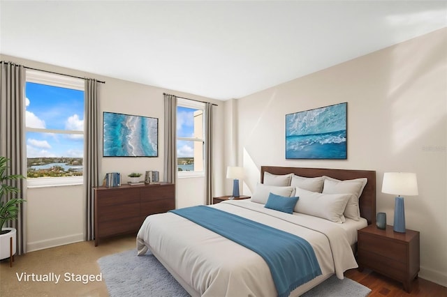 10355 Paradise Blvd Unit 1003, Treasure Island, FL 33706 - bedroom featuring baseboards