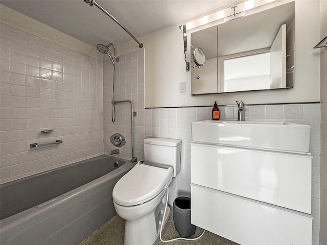10355 Paradise Blvd Unit 1003, Treasure Island, FL 33706 - full bathroom featuring tile walls, tub / shower combination, toilet, and vanity