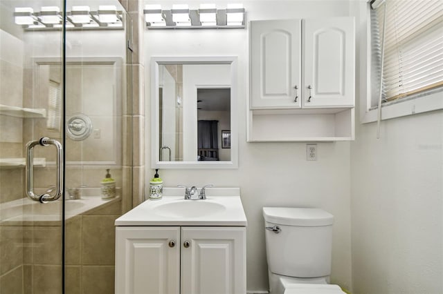 5005 W Evelyn Dr, Tampa, FL 33609 - full bath featuring vanity, a shower stall, and toilet