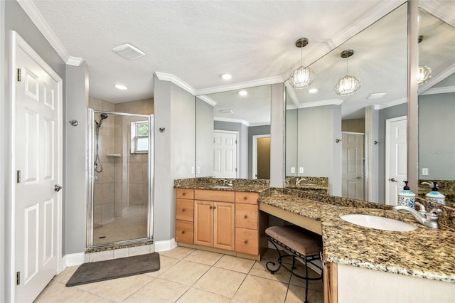 5005 W Evelyn Dr, Tampa, FL 33609 - full bath with ornamental molding, a shower stall, tile patterned flooring, vanity, and baseboards