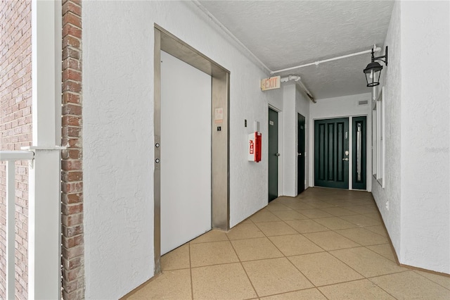 1586 Gulf Blvd Unit 2502, Clearwater, FL 33767 - hallway featuring elevator