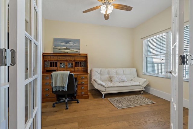 1586 Gulf Blvd Unit 2502, Clearwater, FL 33767 - office space featuring wood finished floors, a ceiling fan, and baseboards