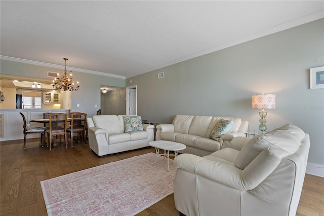 1586 Gulf Blvd Unit 2502, Clearwater, FL 33767 - living room with a chandelier, wood finished floors, and crown molding