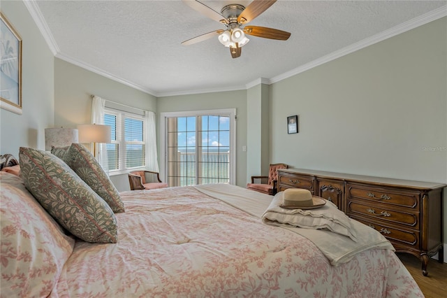 1586 Gulf Blvd Unit 2502, Clearwater, FL 33767 - bedroom with a textured ceiling, crown molding, wood finished floors, access to exterior, and ceiling fan