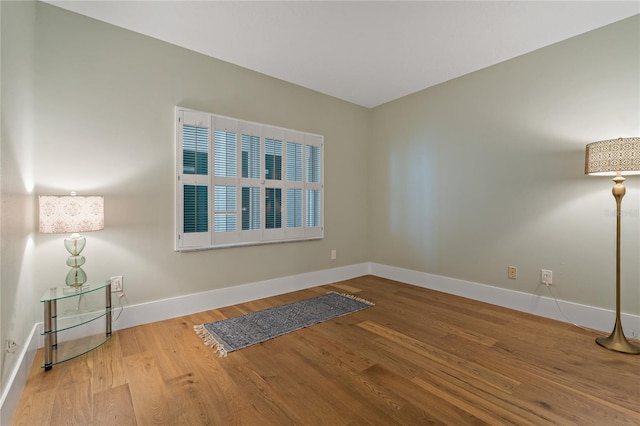 1586 Gulf Blvd Unit 2502, Clearwater, FL 33767 - empty room featuring wood finished floors and baseboards