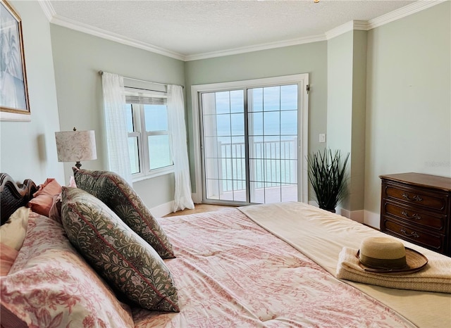 1586 Gulf Blvd Unit 2502, Clearwater, FL 33767 - bedroom with ornamental molding, access to outside, and a textured ceiling