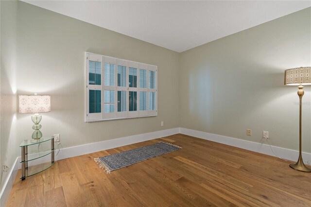 1586 Gulf Blvd Unit 2502, Clearwater, FL 33767 - spare room with wood finished floors and baseboards