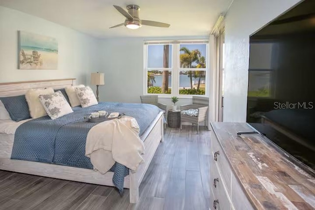5701 Bahia Del Mar Cir Unit 108, Saint Petersburg, FL 33715 - bedroom featuring wood finished floors and a ceiling fan