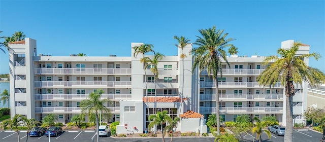 5701 Bahia Del Mar Cir Unit 108, Saint Petersburg, FL 33715 - view of apartment building / complex featuring uncovered parking