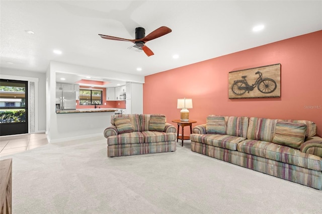 2510 Laurelwood Dr Unit 5B, Clearwater, FL 33763 - living room with light colored carpet, recessed lighting, a ceiling fan, and baseboards
