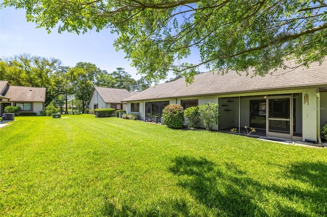 2510 Laurelwood Dr Unit 5B, Clearwater, FL 33763 - view of grassy yard with central AC