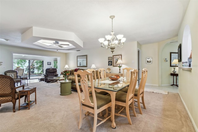 3476 Tarpon Woods Blvd, Palm Harbor, FL 34685 - dining room with light carpet, arched walkways, a chandelier, and baseboards