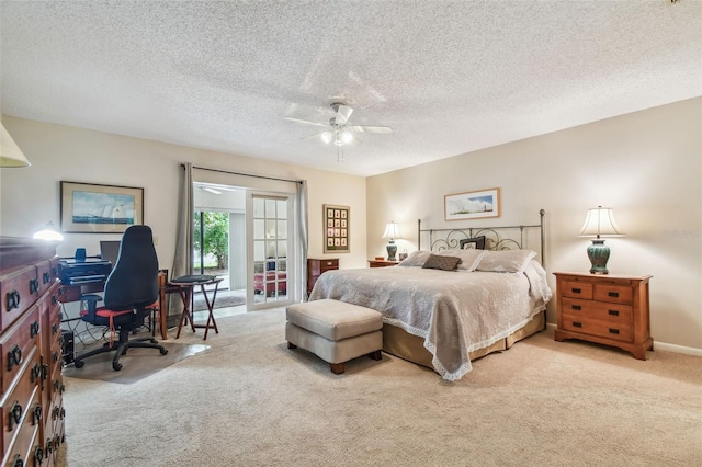 3476 Tarpon Woods Blvd, Palm Harbor, FL 34685 - carpeted bedroom with an office area, access to exterior, a ceiling fan, and a textured ceiling