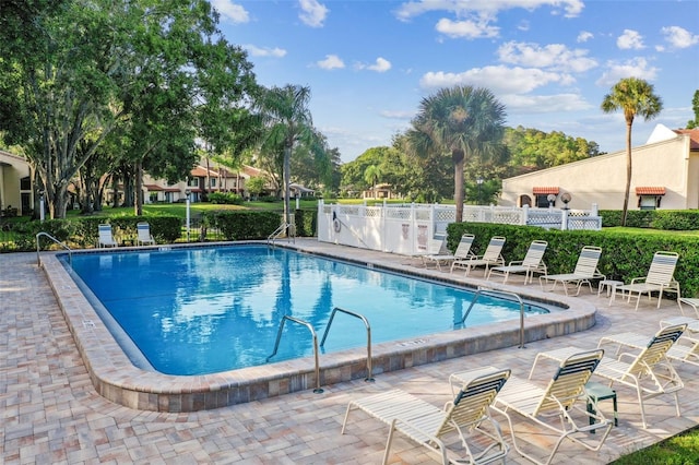 3476 Tarpon Woods Blvd, Palm Harbor, FL 34685 - community pool featuring a patio