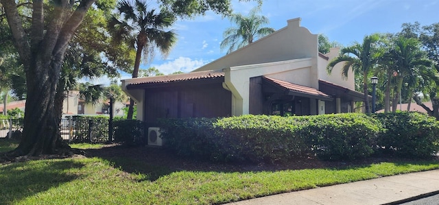 3476 Tarpon Woods Blvd, Palm Harbor, FL 34685 - view of property exterior with a cooling unit