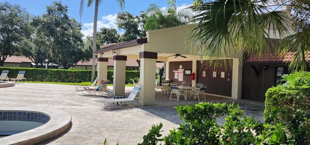 3476 Tarpon Woods Blvd, Palm Harbor, FL 34685 - view of patio featuring a ceiling fan and outdoor dining area
