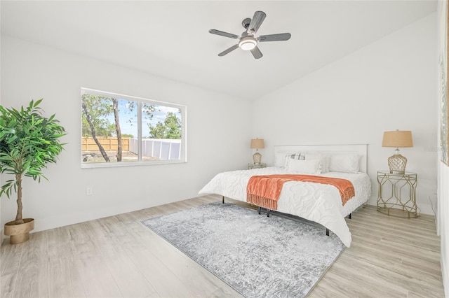 10538 Juliano Dr, Riverview, FL 33569 - bedroom with wood finished floors, lofted ceiling, and ceiling fan