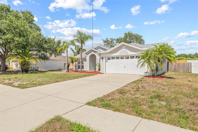 10538 Juliano Dr, Riverview, FL 33569 - ranch-style house featuring a garage, stucco siding, and driveway