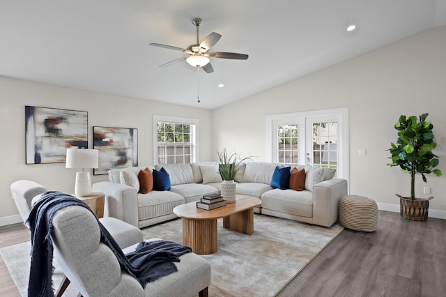 4121 W San Nicholas St, Tampa, FL 33629 - living room featuring lofted ceiling, light wood-type flooring, ceiling fan, baseboards, and recessed lighting