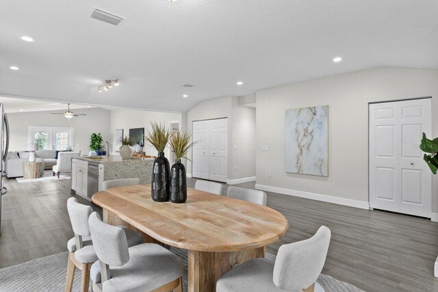 4121 W San Nicholas St, Tampa, FL 33629 - dining area featuring dark wood-style flooring, vaulted ceiling, recessed lighting, baseboards, and a ceiling fan