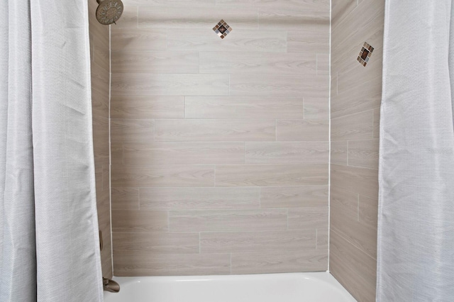 4121 W San Nicholas St, Tampa, FL 33629 - bathroom featuring shower / bathtub combination with curtain