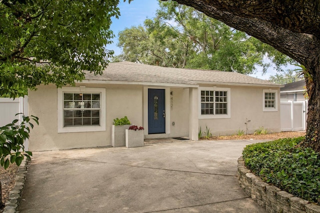 4121 W San Nicholas St, Tampa, FL 33629 - single story home featuring stucco siding, a patio, and a shingled roof