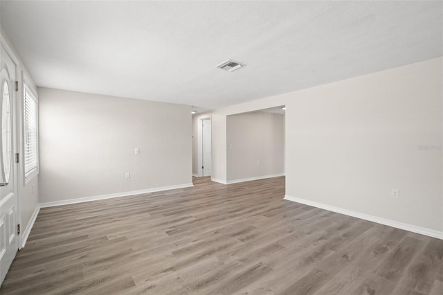 5122 Chet Dr, New Port Richey, FL 34652 - empty room featuring light wood finished floors and baseboards