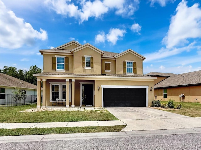 4916 Rolling Green Dr, Wesley Chapel, FL 33543 - traditional-style house with stucco siding, covered porch, a garage, and concrete driveway