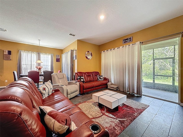 4916 Rolling Green Dr, Wesley Chapel, FL 33543 - living room with a textured ceiling