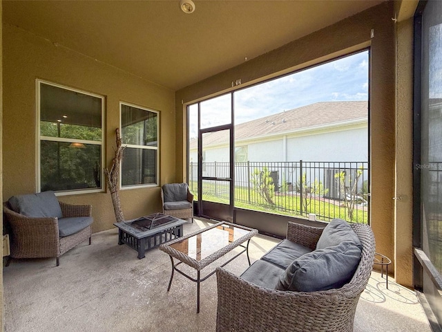 4916 Rolling Green Dr, Wesley Chapel, FL 33543 - sunroom with an outdoor living space with a fire pit