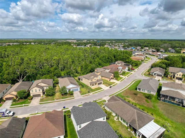4916 Rolling Green Dr, Wesley Chapel, FL 33543 - aerial perspective of suburban area featuring a heavily wooded area