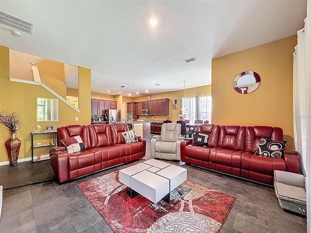 4916 Rolling Green Dr, Wesley Chapel, FL 33543 - living room featuring baseboards and recessed lighting