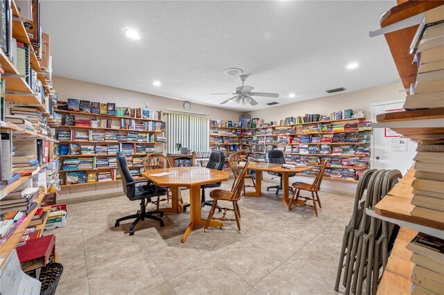 2928 Feather Dr, Clearwater, FL 33759 - dining room with a ceiling fan, recessed lighting, and a textured ceiling