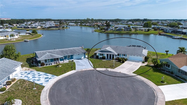 1009 Andover Cir, Sun City Center, FL 33573 - aerial view of residential area with a nearby body of water