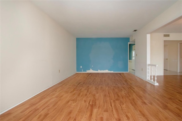1009 Andover Cir, Sun City Center, FL 33573 - unfurnished room featuring light wood-style floors