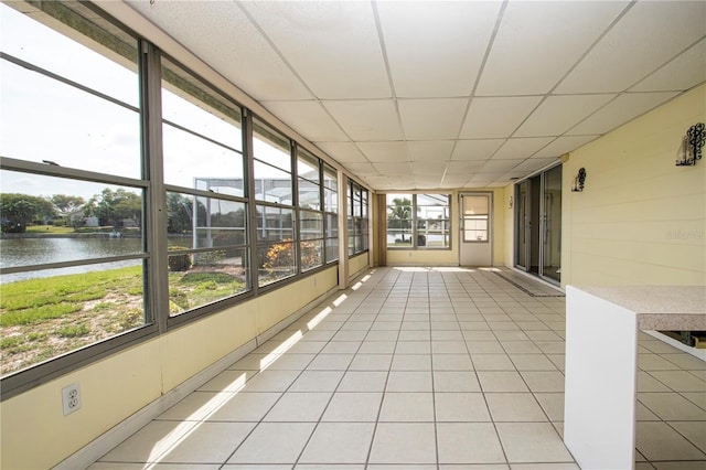 1009 Andover Cir, Sun City Center, FL 33573 - unfurnished sunroom with a water view