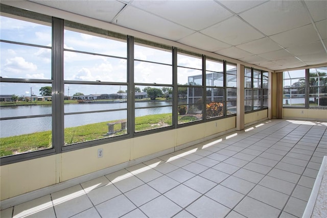 1009 Andover Cir, Sun City Center, FL 33573 - unfurnished sunroom featuring a water view