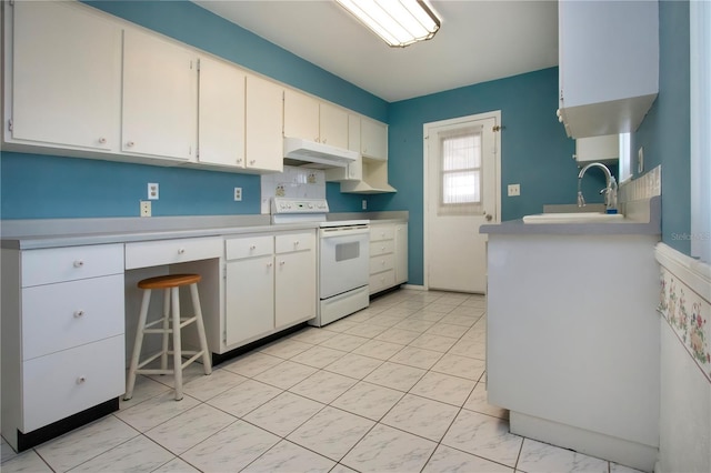 1009 Andover Cir, Sun City Center, FL 33573 - kitchen with white electric range oven, under cabinet range hood, a sink, light countertops, and white cabinets
