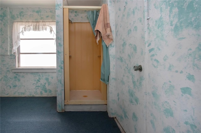 1009 Andover Cir, Sun City Center, FL 33573 - unfurnished bedroom featuring wallpapered walls and carpet floors