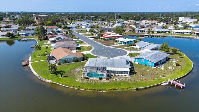 1009 Andover Cir, Sun City Center, FL 33573 - aerial perspective of suburban area featuring a nearby body of water