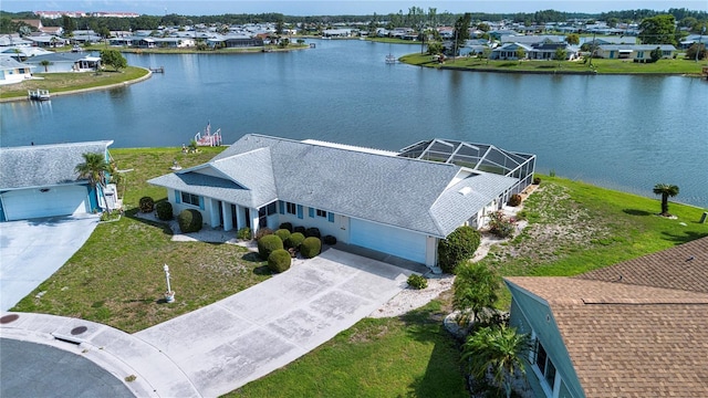 1009 Andover Cir, Sun City Center, FL 33573 - aerial perspective of suburban area with a nearby body of water