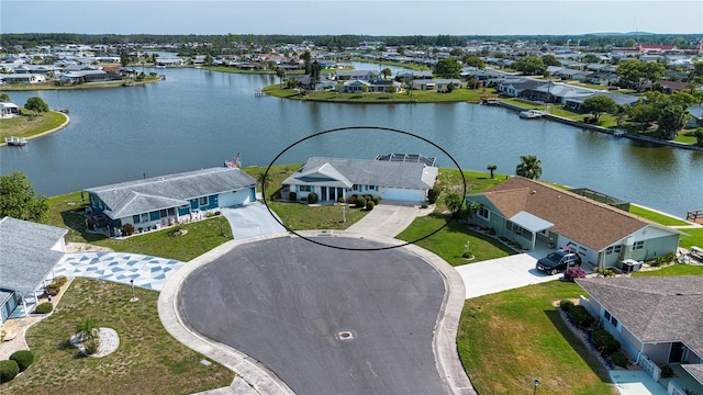 1009 Andover Cir, Sun City Center, FL 33573 - aerial perspective of suburban area featuring a large body of water