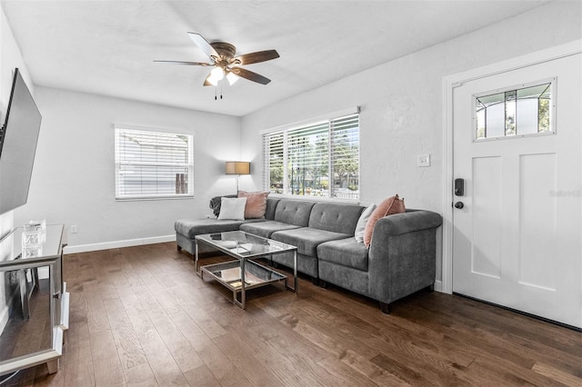 4531 7th Ave N, Saint Petersburg, FL 33713 - living room with a ceiling fan, dark wood finished floors, and baseboards