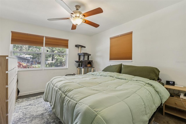 1015 13th Ave NW, Largo, FL 33770 - bedroom featuring carpet floors and ceiling fan