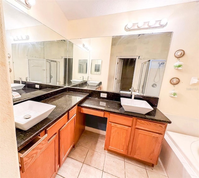 9735 Riverchase Dr, New Port Richey, FL 34655 - full bath featuring tile patterned floors, a stall shower, a garden tub, and double vanity
